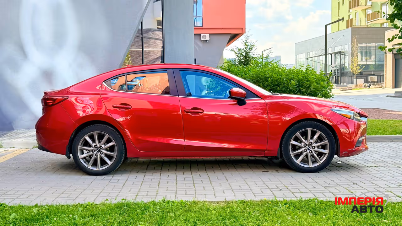 Mazda 3 - фото 8