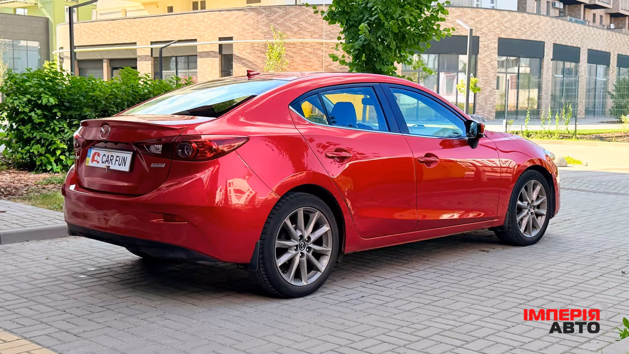 Mazda 3 - фото 7