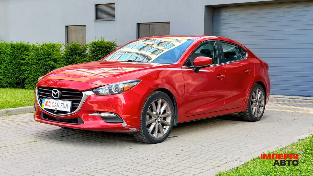 Mazda 3 - фото 1