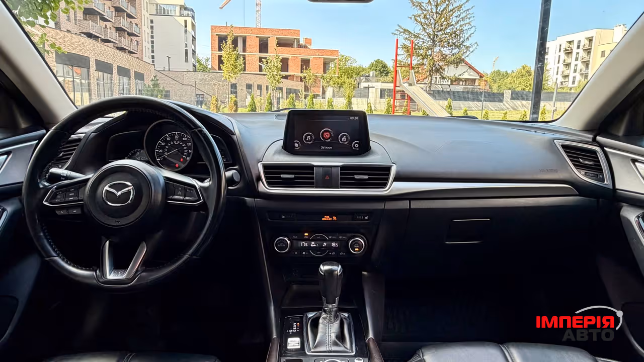 Mazda 3 - фото 18