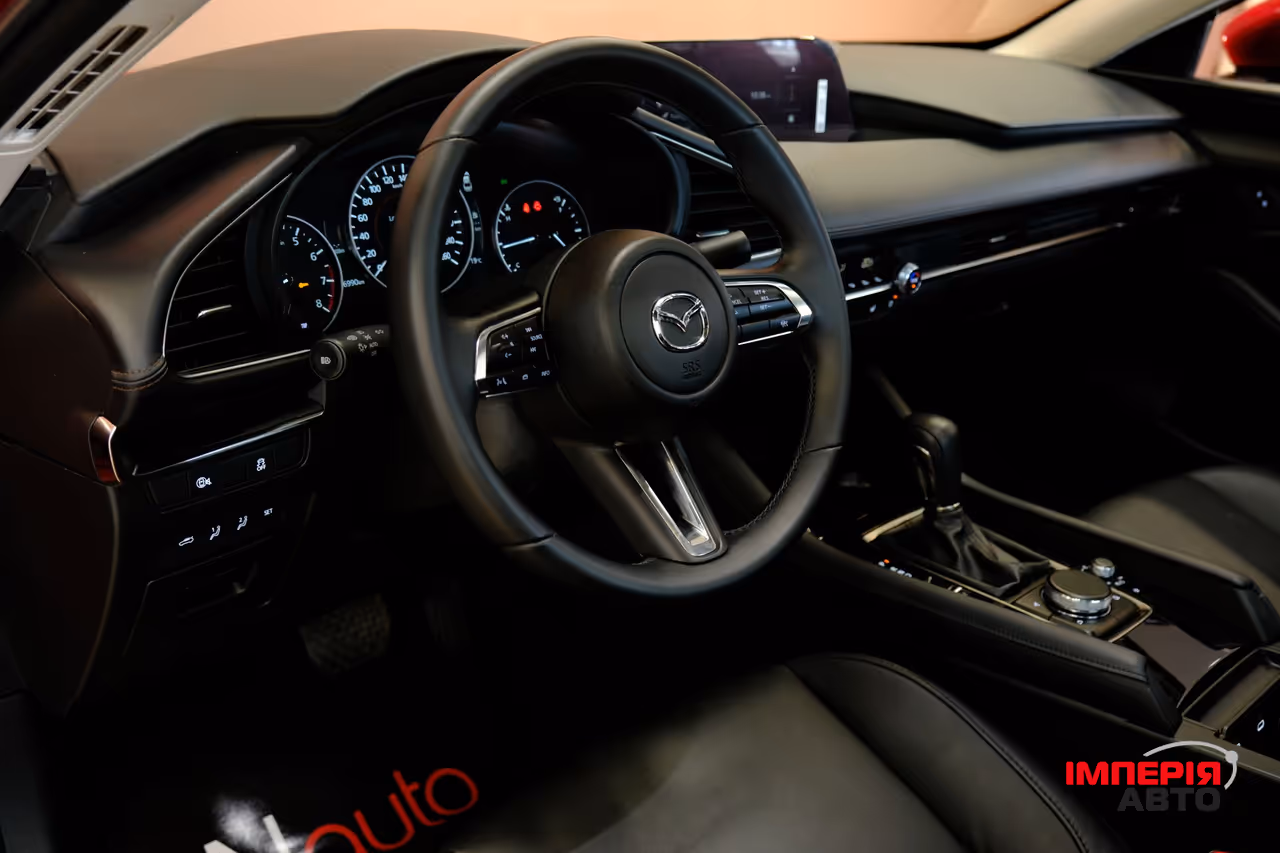 Mazda 3 - фото 7
