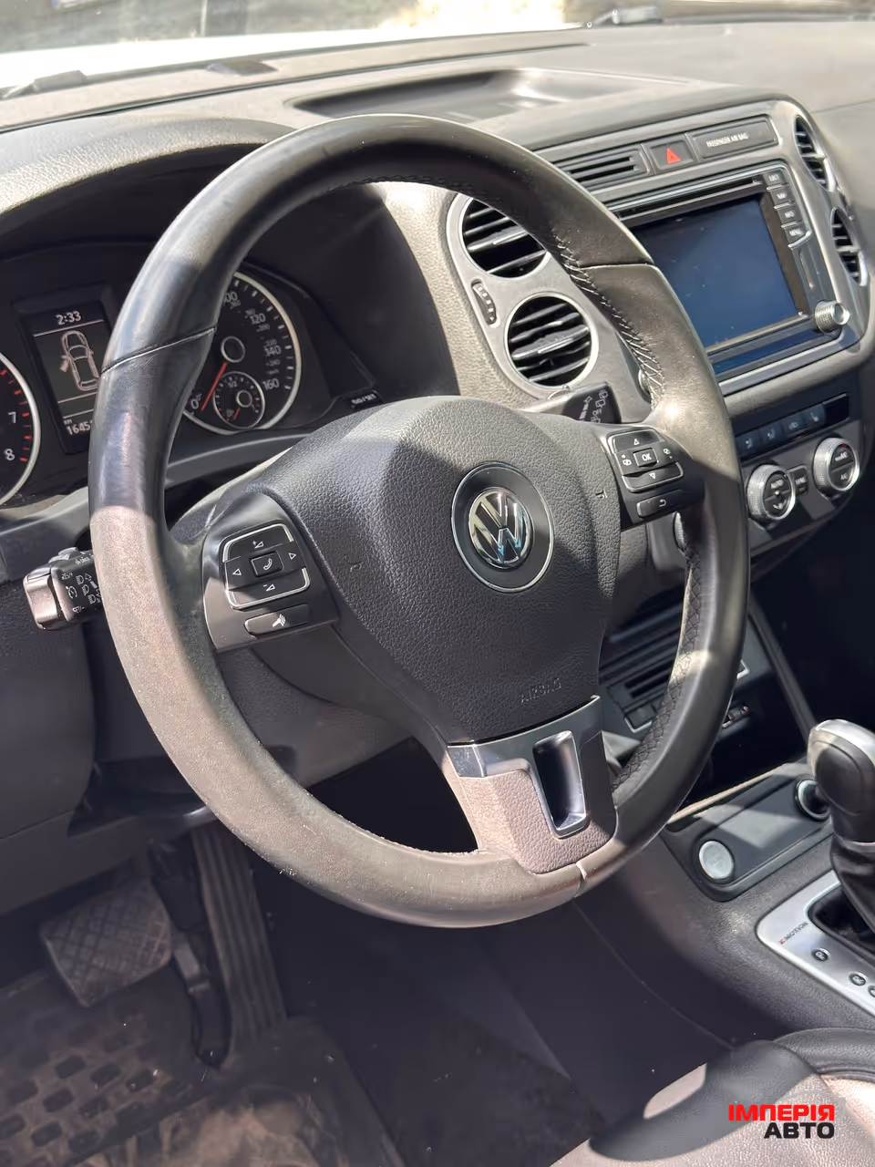 Volkswagen Tiguan - фото 9