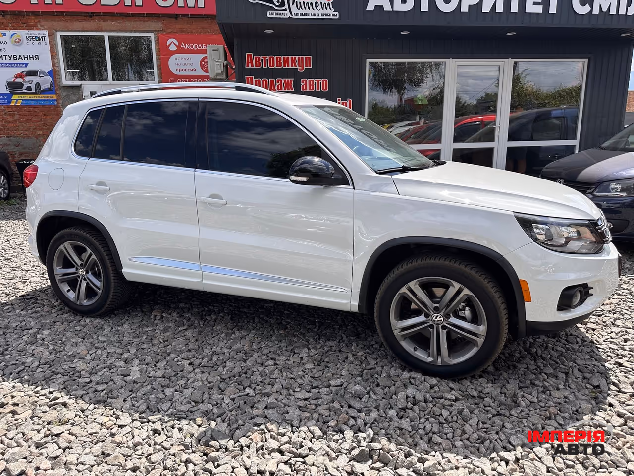Volkswagen Tiguan - фото 16