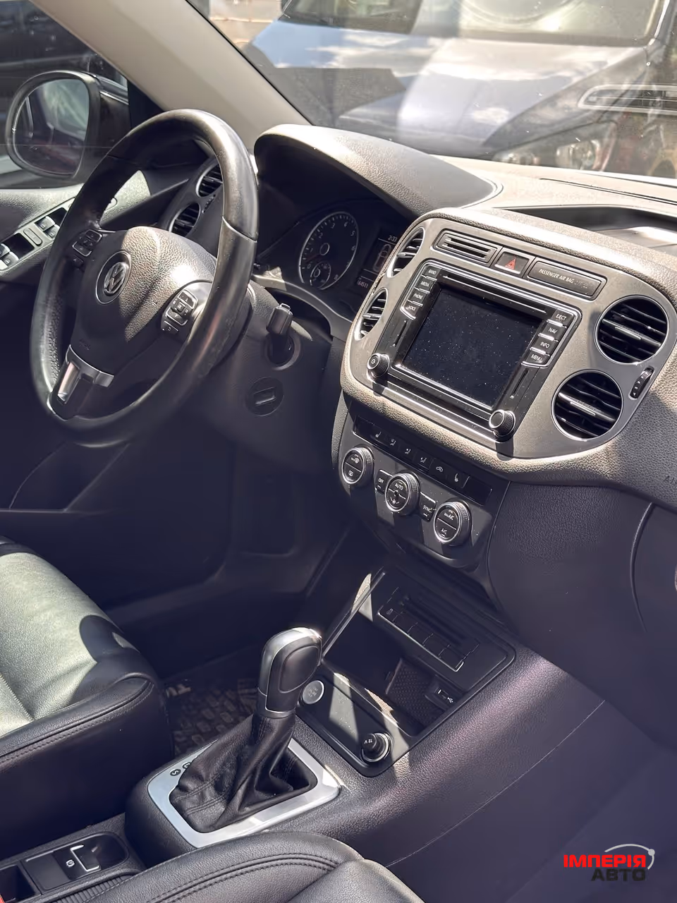 Volkswagen Tiguan - фото 7