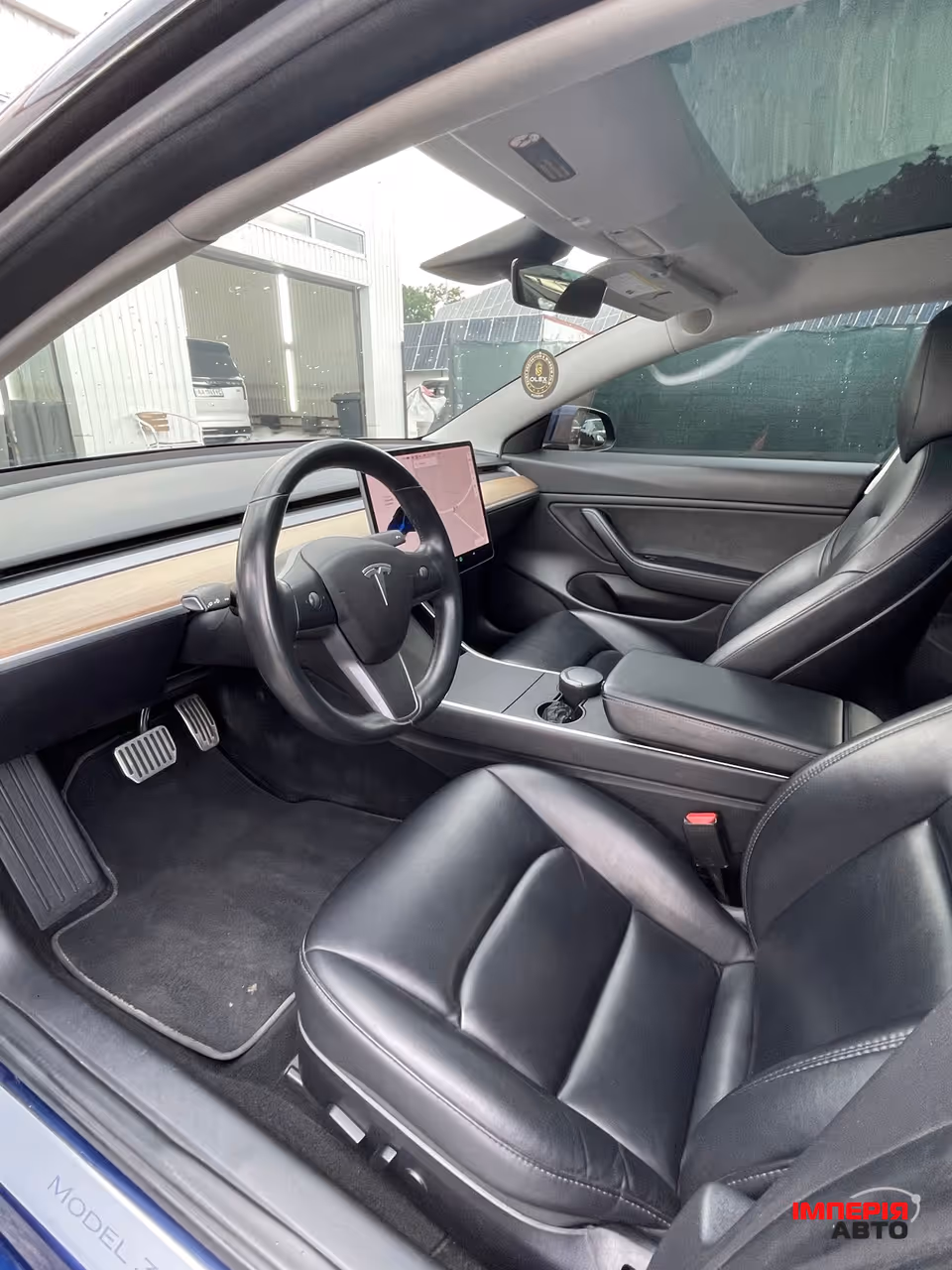 Tesla Model 3 - фото 10