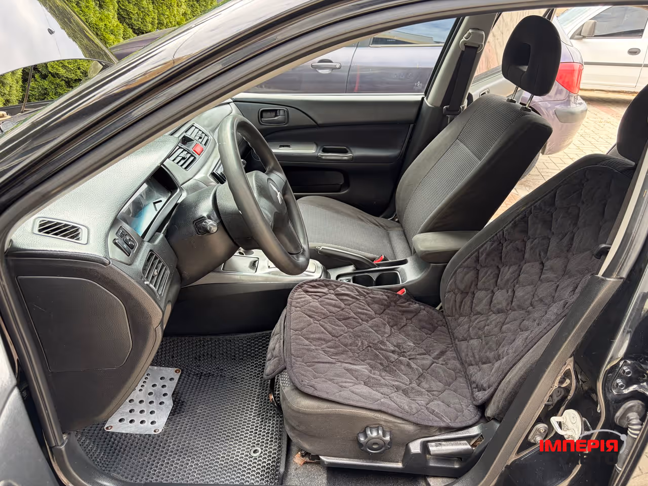 Mitsubishi Lancer - фото 5