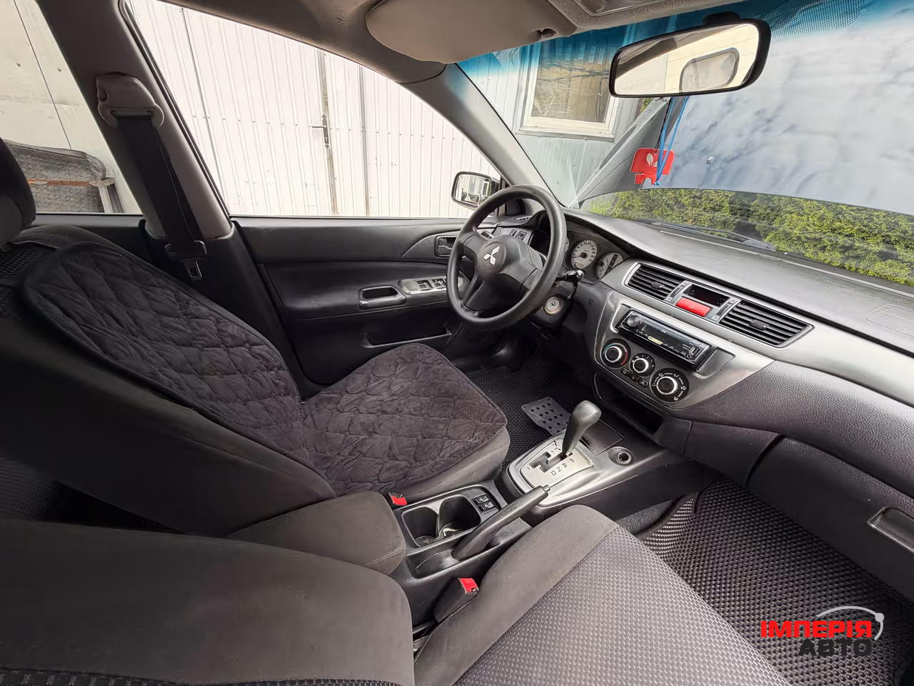 Mitsubishi Lancer - фото 7
