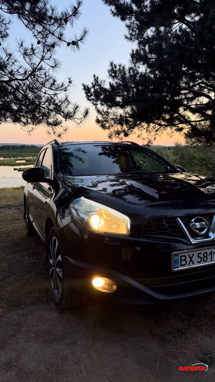 Nissan Qashqai+2 - фото 1