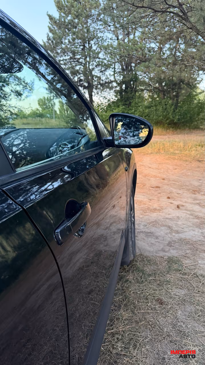 Nissan Qashqai+2 - фото 9