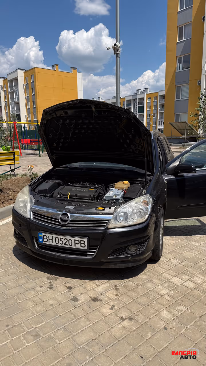 Opel Astra - фото 5
