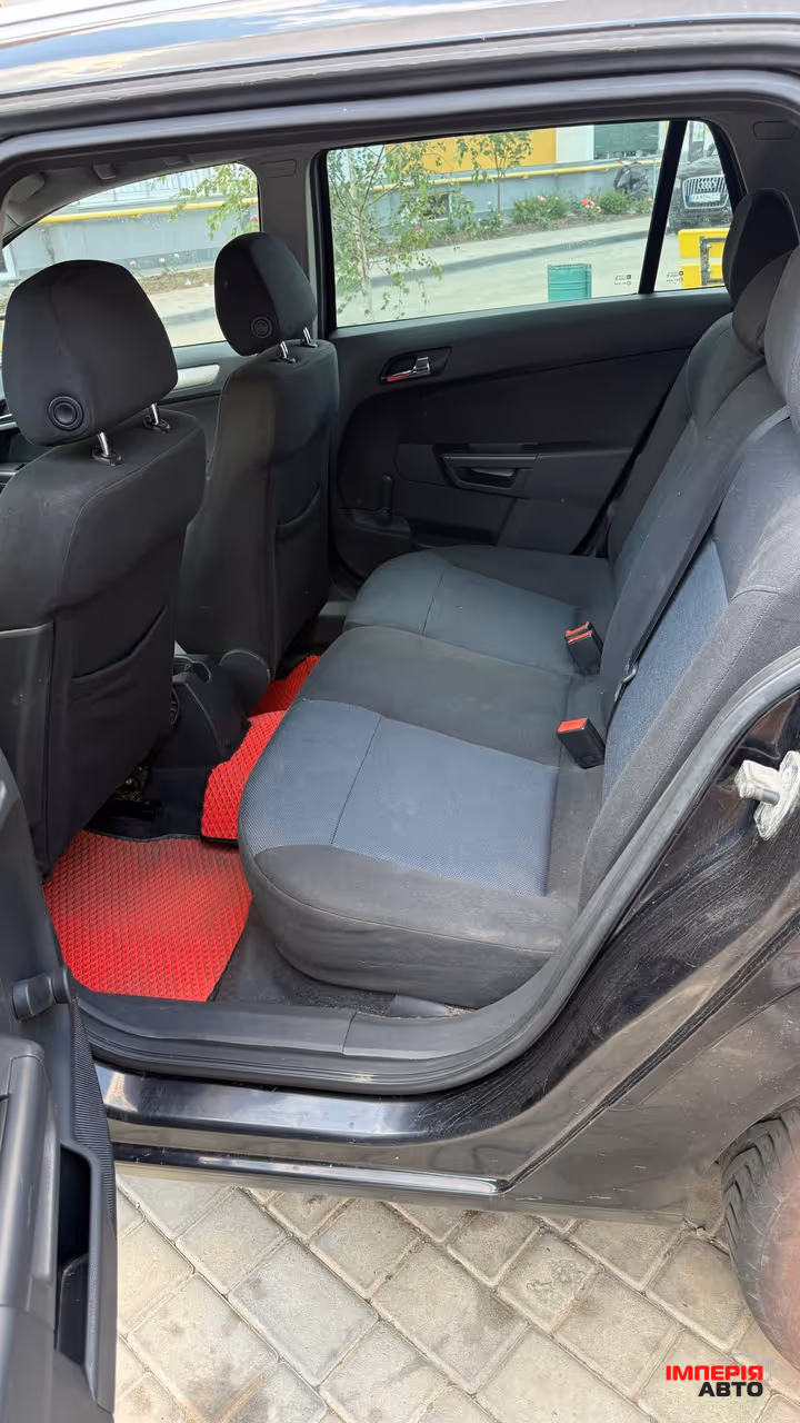Opel Astra - фото 9