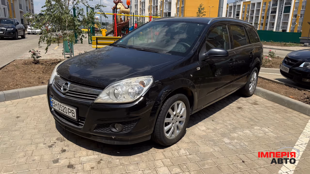 Opel Astra - фото 1