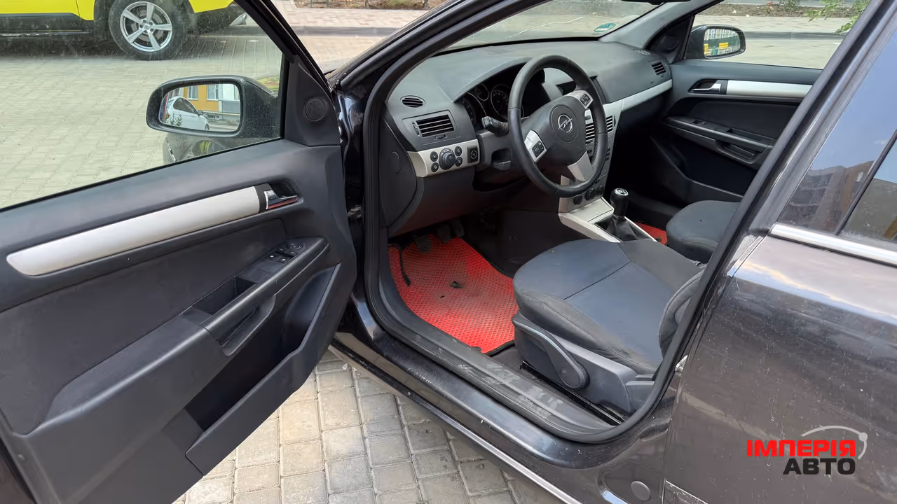 Opel Astra - фото 6