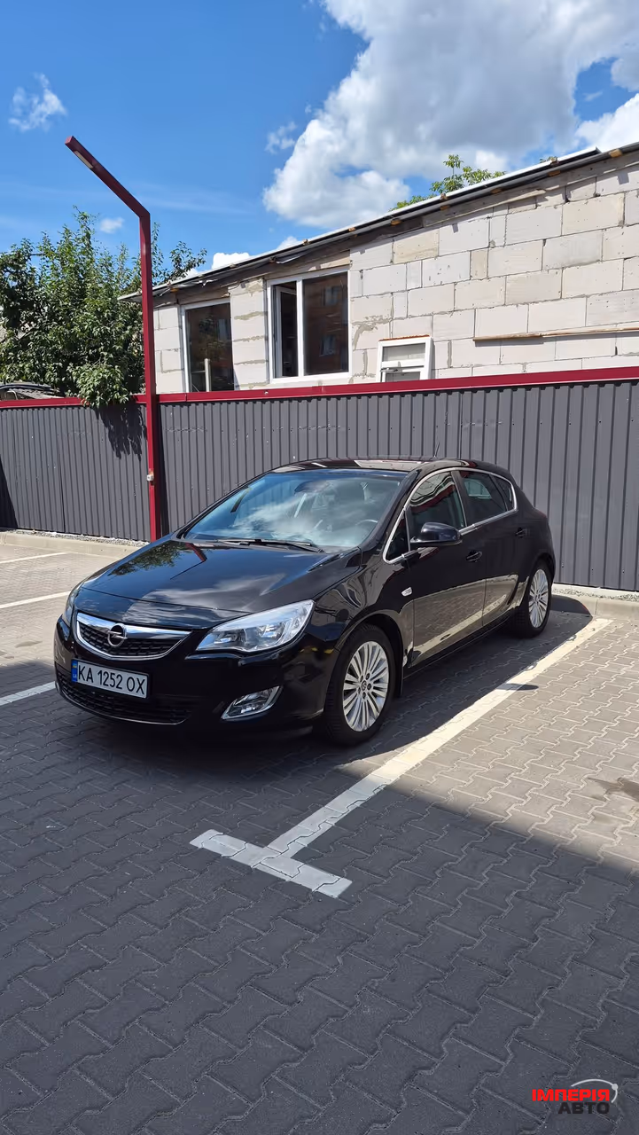 Opel Astra - фото 1