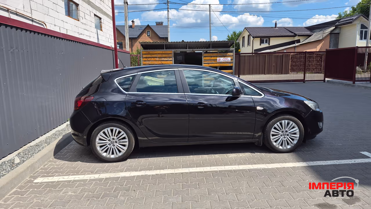 Opel Astra - фото 6