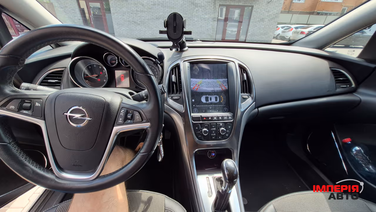 Opel Astra - фото 11