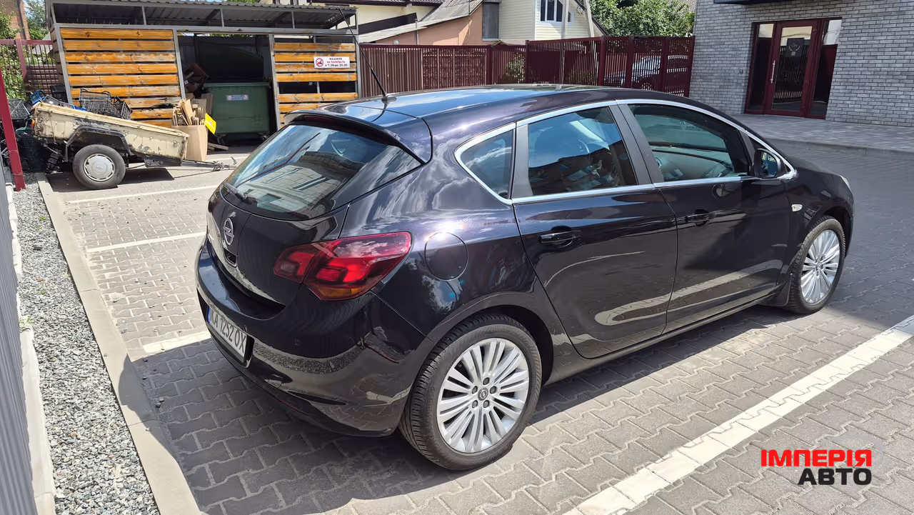 Opel Astra - фото 7