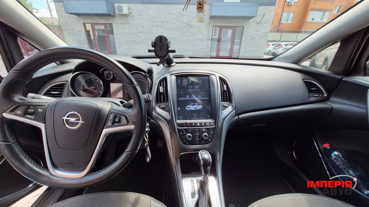 Opel Astra - фото 12