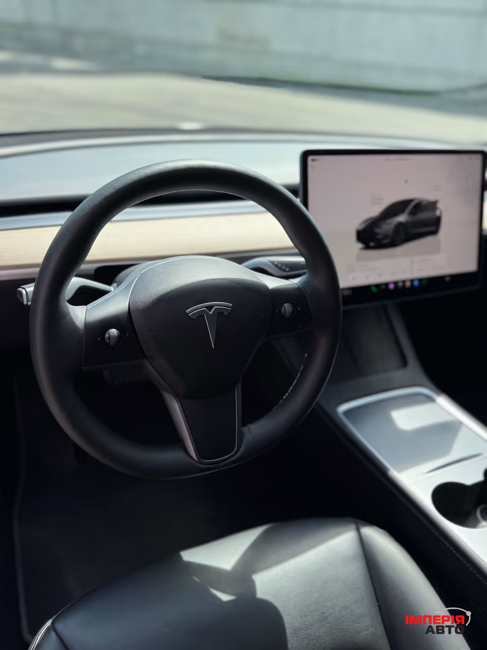 Tesla Model 3 - фото 11