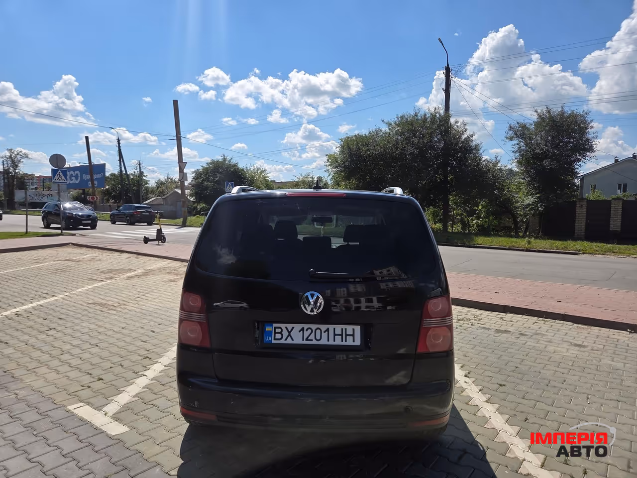 Volkswagen Touran - фото 7