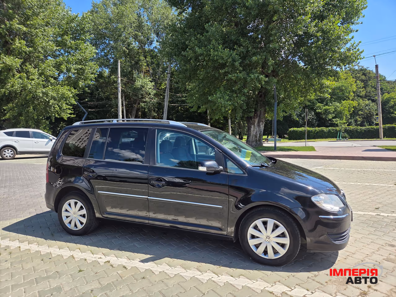 Volkswagen Touran - фото 4