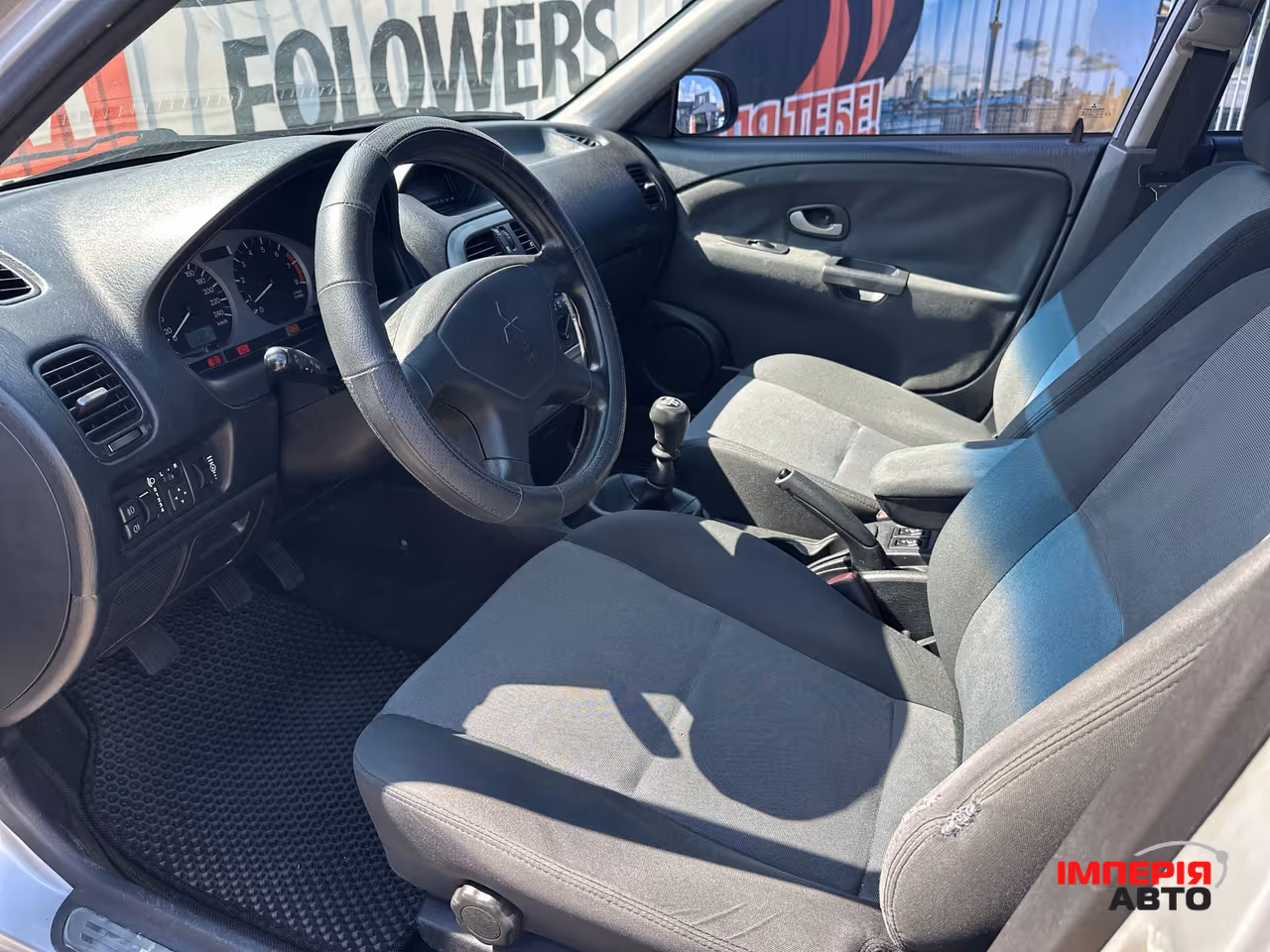 Mitsubishi Carisma - фото 9
