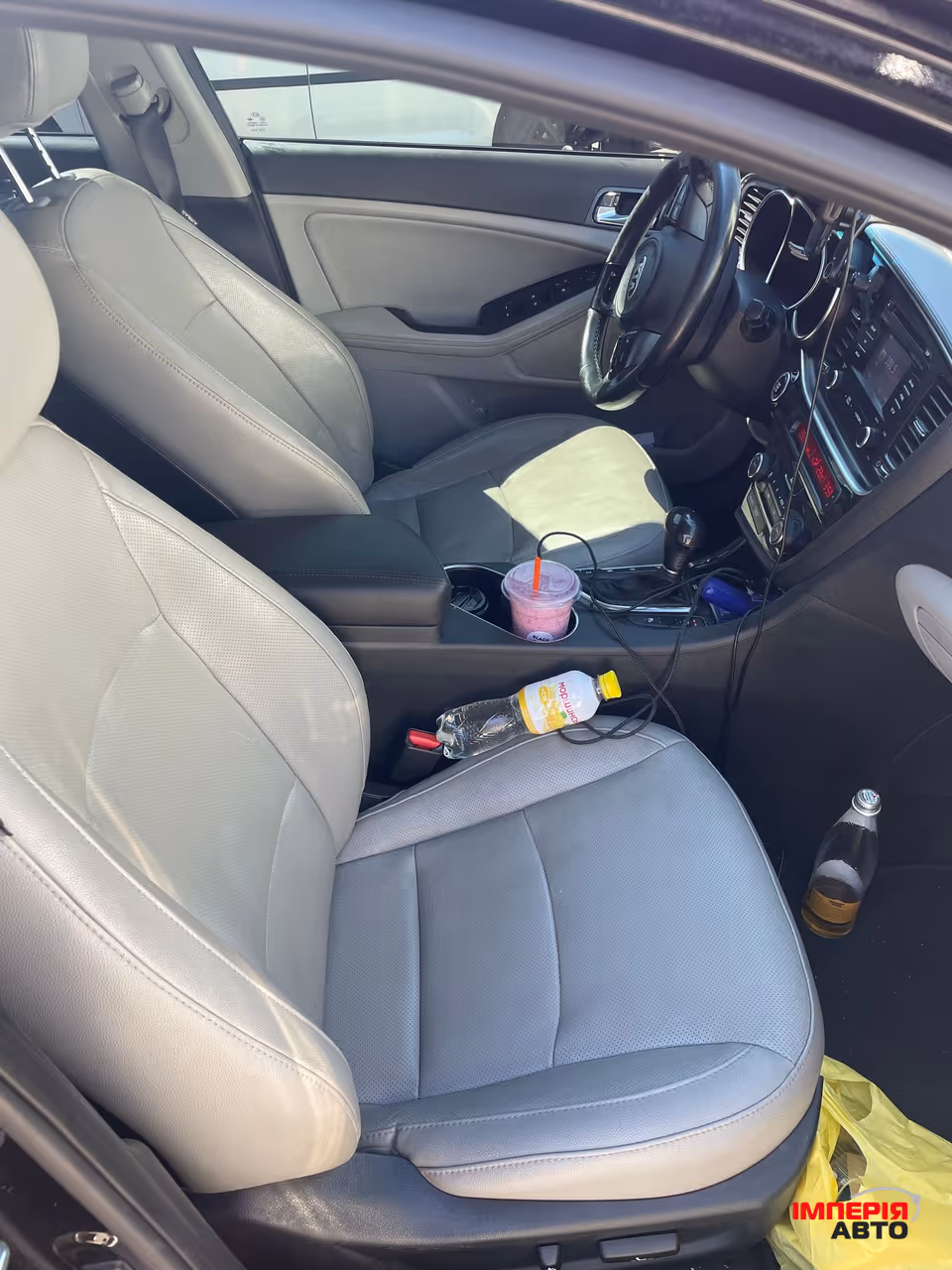 Kia Optima - фото 7