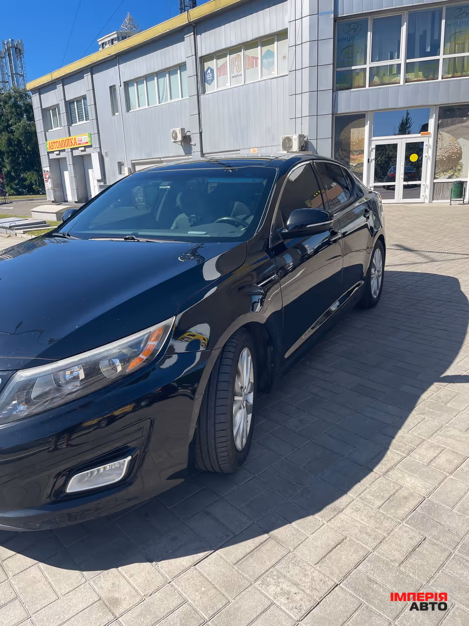 Kia Optima - фото 1