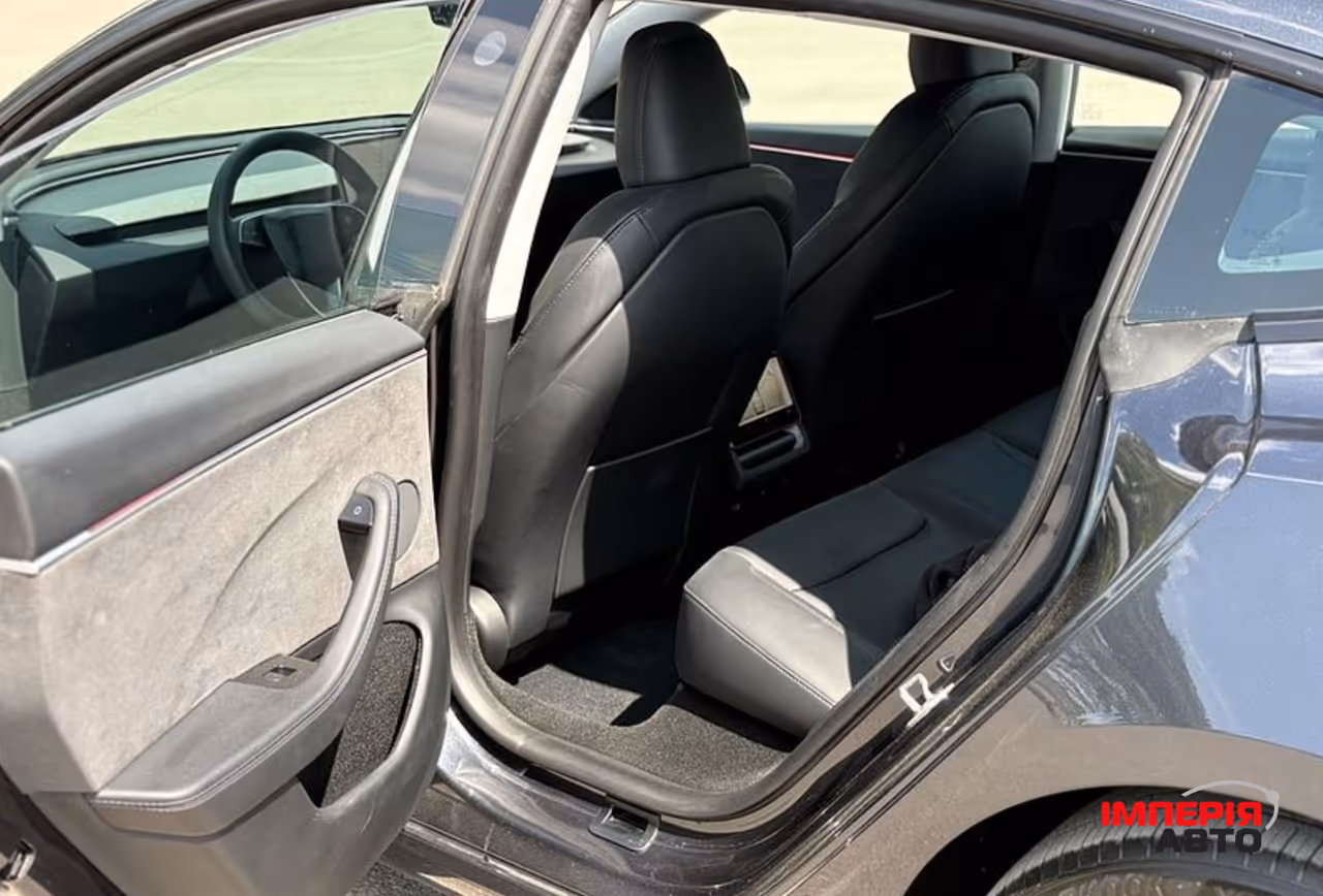Tesla Model 3 - фото 14