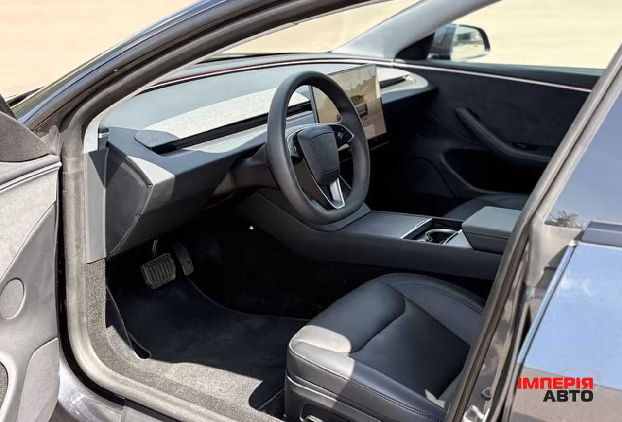 Tesla Model 3 - фото 12