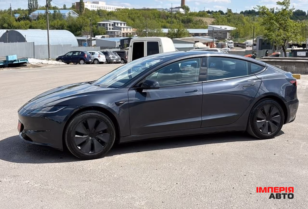 Tesla Model 3 - фото 10