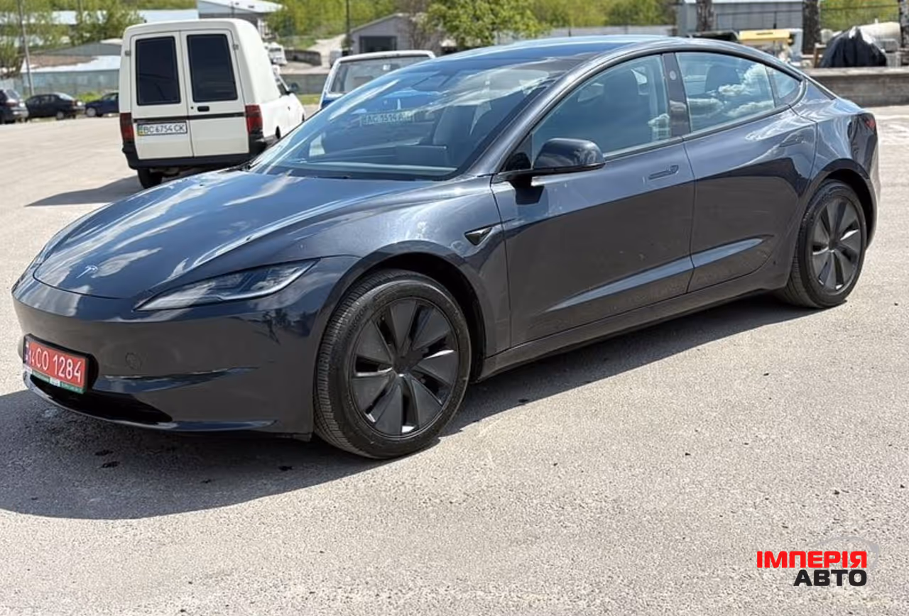 Tesla Model 3 - фото 11