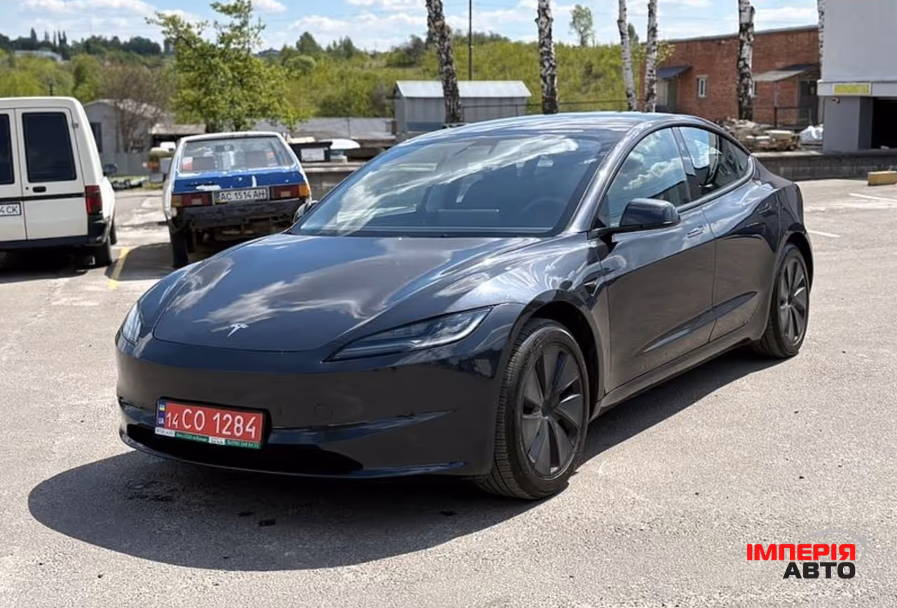 Tesla Model 3 - фото 1