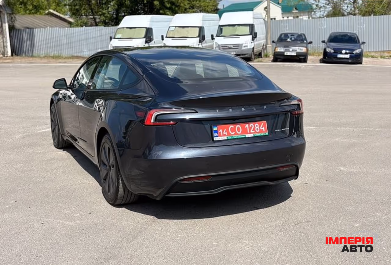 Tesla Model 3 - фото 7