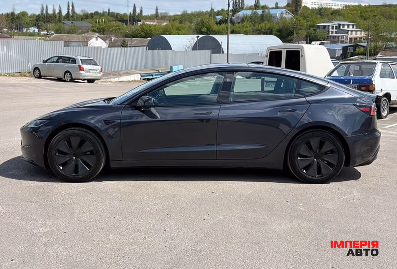 Tesla Model 3 - фото 9