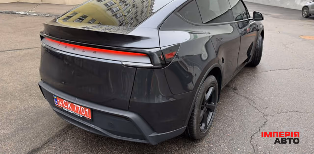 Tesla Model Y - фото 8
