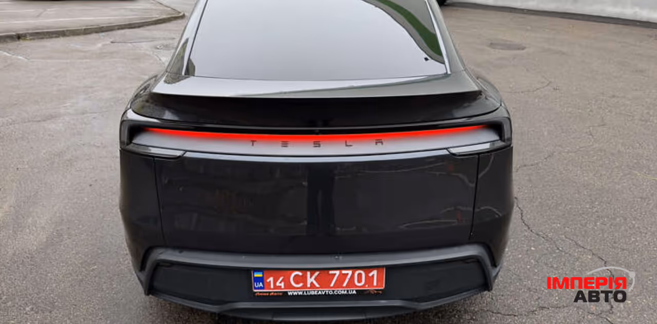 Tesla Model Y - фото 11