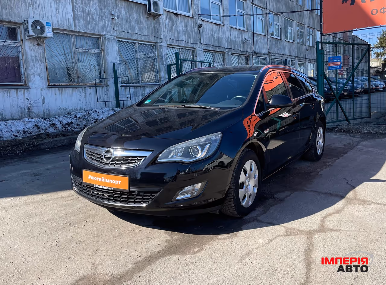 Opel Astra - фото 11