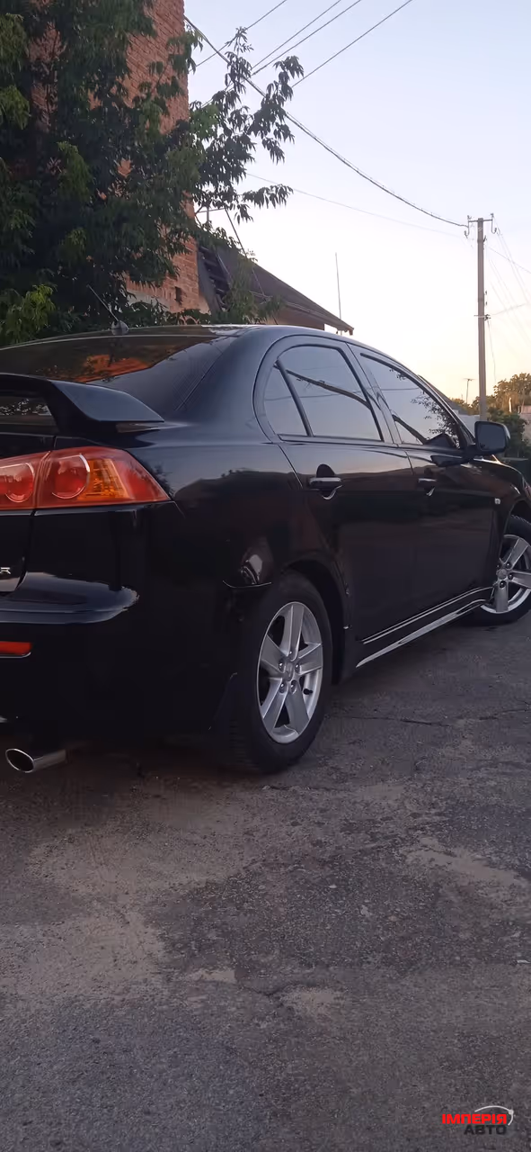 Mitsubishi Lancer - фото 5