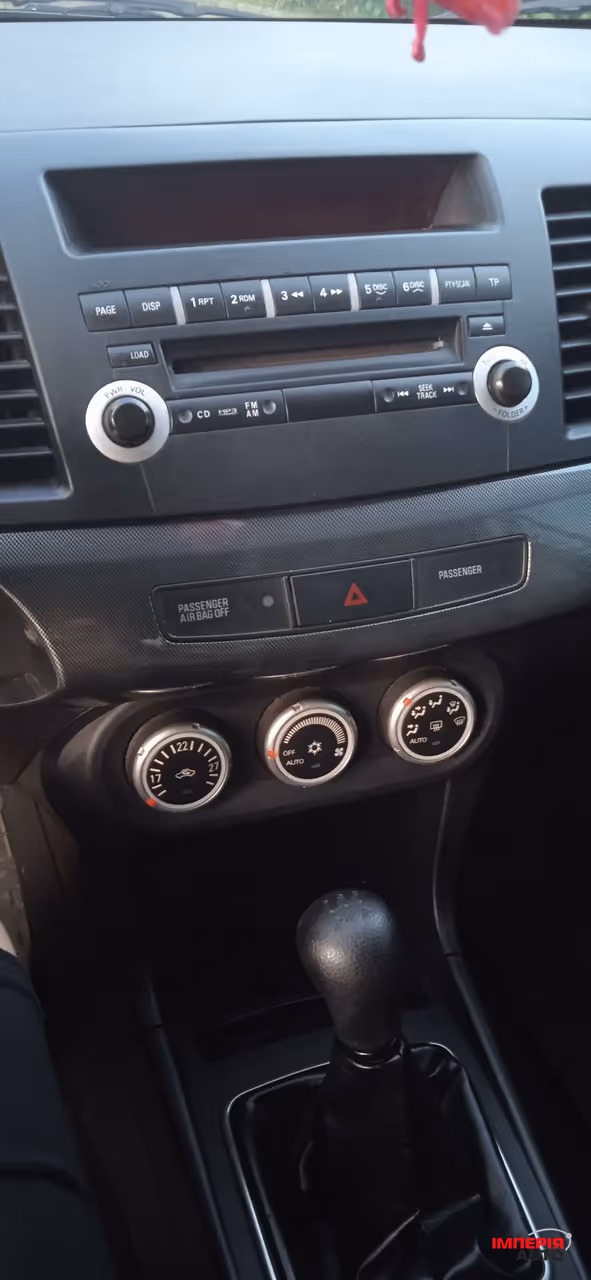 Mitsubishi Lancer - фото 10