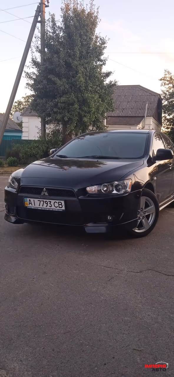 Mitsubishi Lancer - фото 4