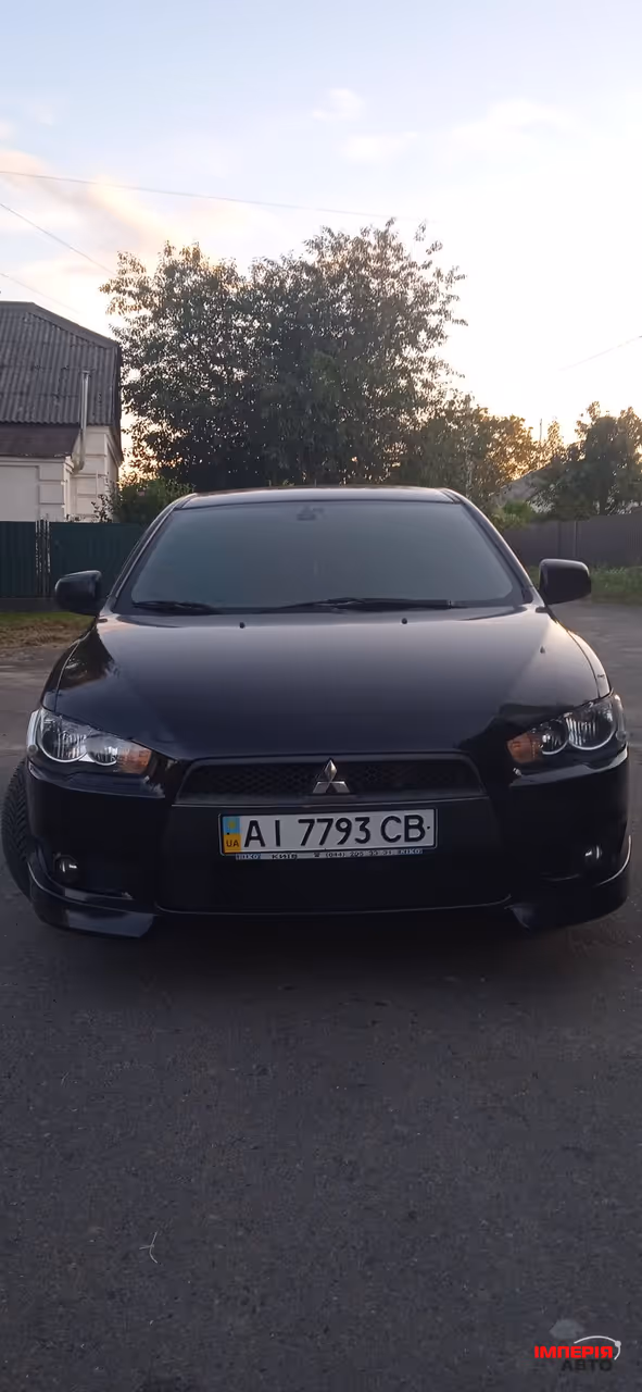 Mitsubishi Lancer - фото 1