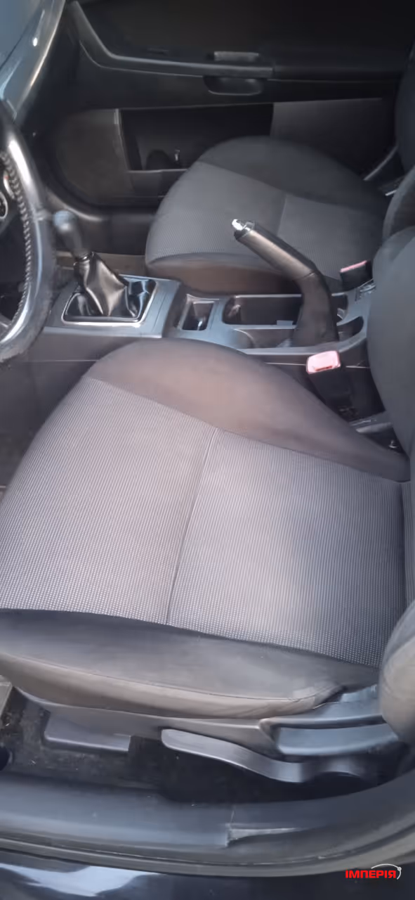 Mitsubishi Lancer - фото 14