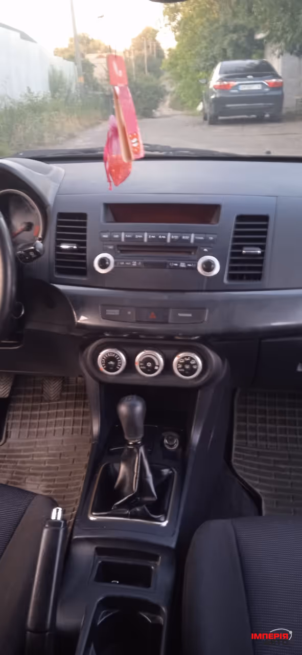 Mitsubishi Lancer - фото 12