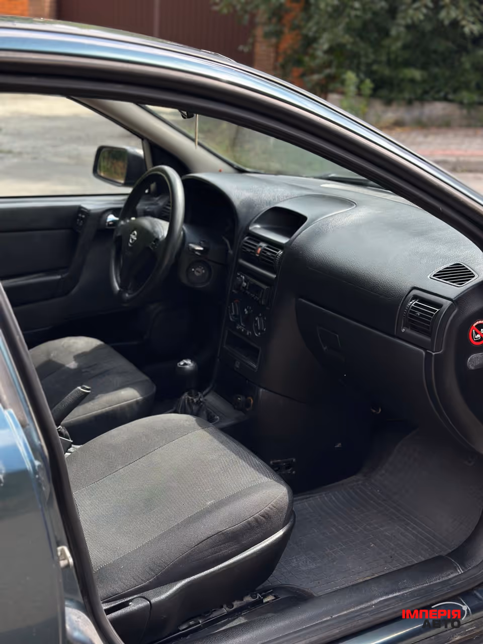 Opel Astra - фото 11