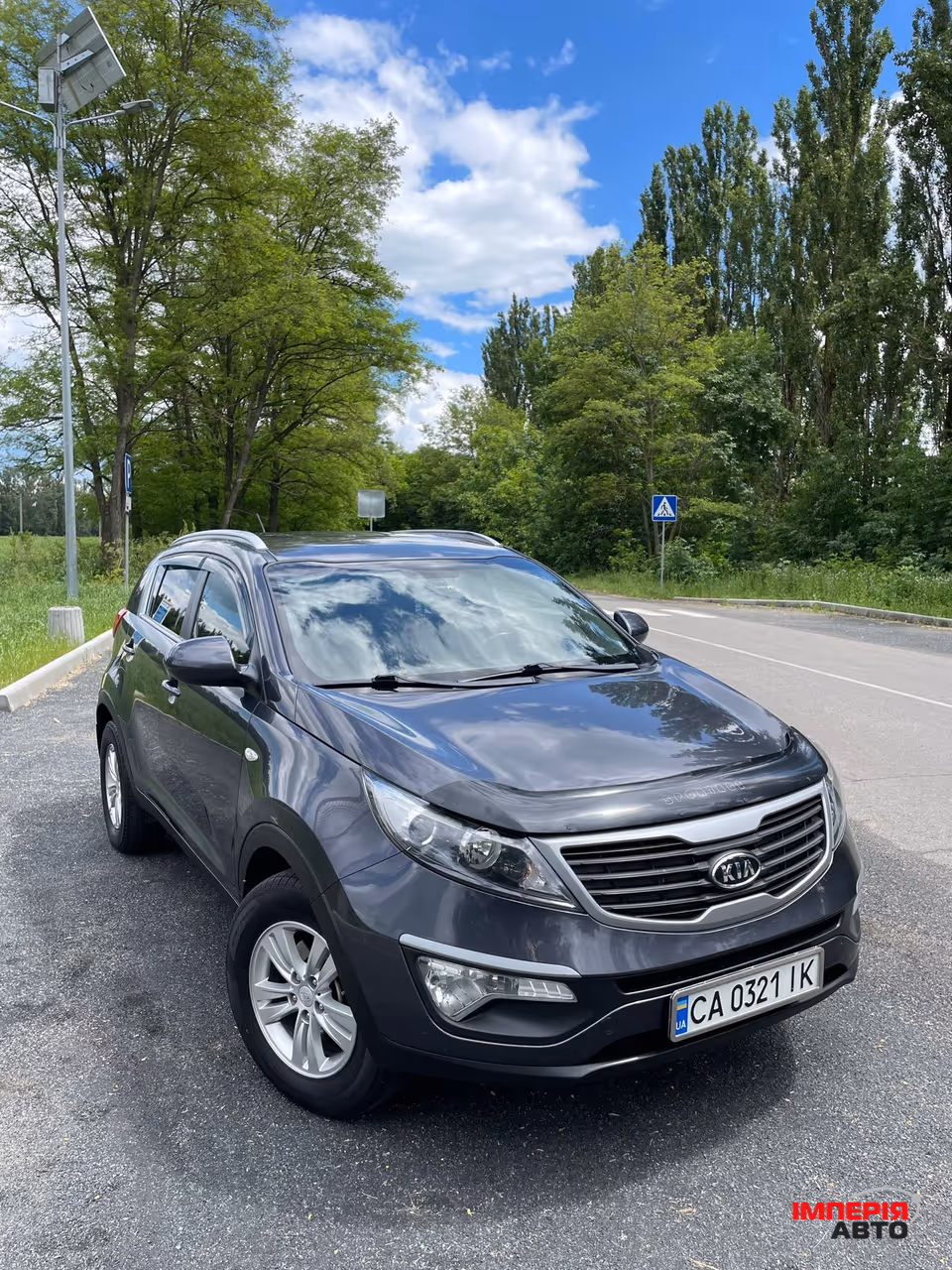 Kia Sportage - фото 1