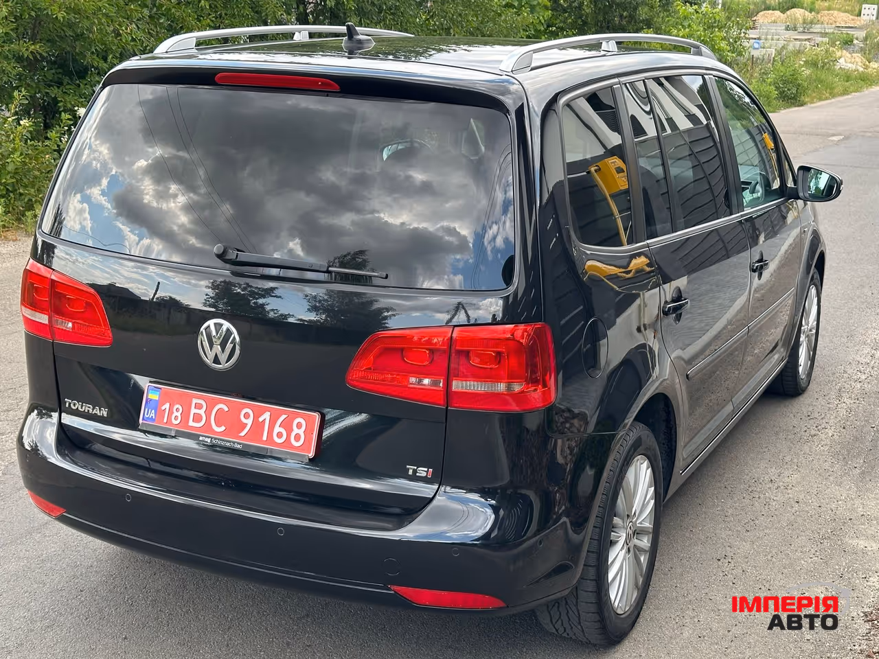 Volkswagen Touran - фото 5