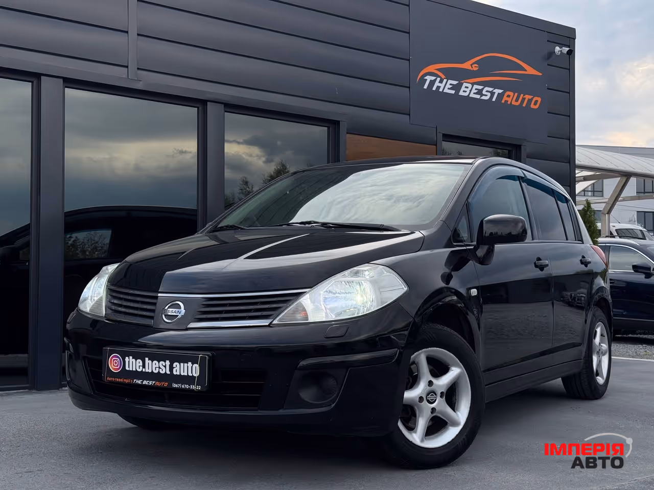 Nissan Tiida - фото 1