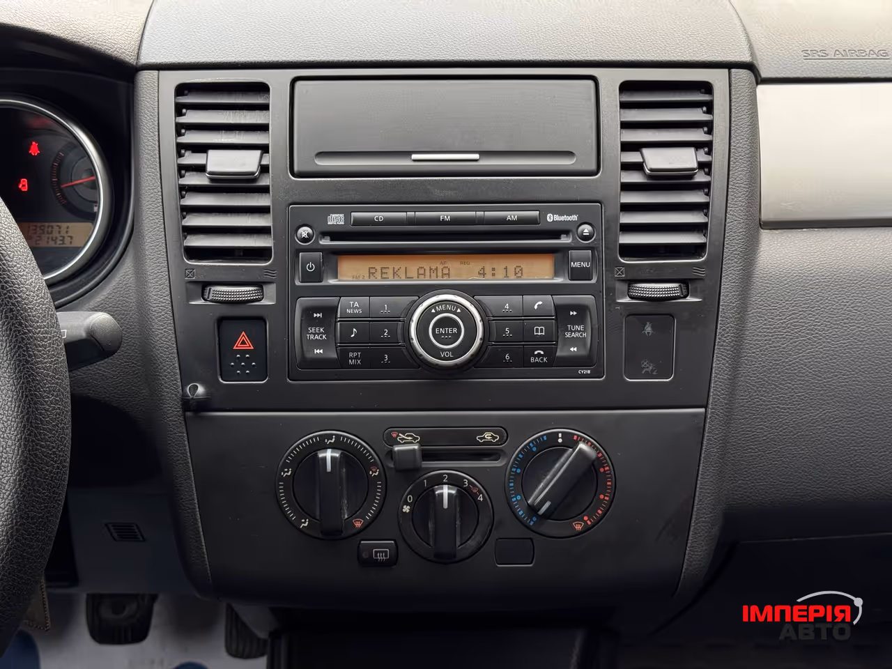 Nissan Tiida - фото 38