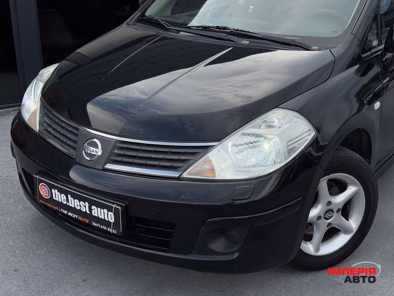 Nissan Tiida - фото 2